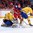 MONTREAL, CANADA - JANUARY 5: Sweden's Felix Sandstrom #1 makes the save while teammate Gabriel Carlsson #9  battles with Russia's Danila Kvartalnov #8 during bronze medal game action at the 2017 IIHF World Junior Championship. (Photo by Andre Ringuette/HHOF-IIHF Images)

